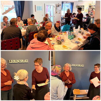 Eine Gemeinschaft trifft sich im "Lieblingsplatz" zum Essen und Austausch, während eine Person eine Auszeichnung überreicht.